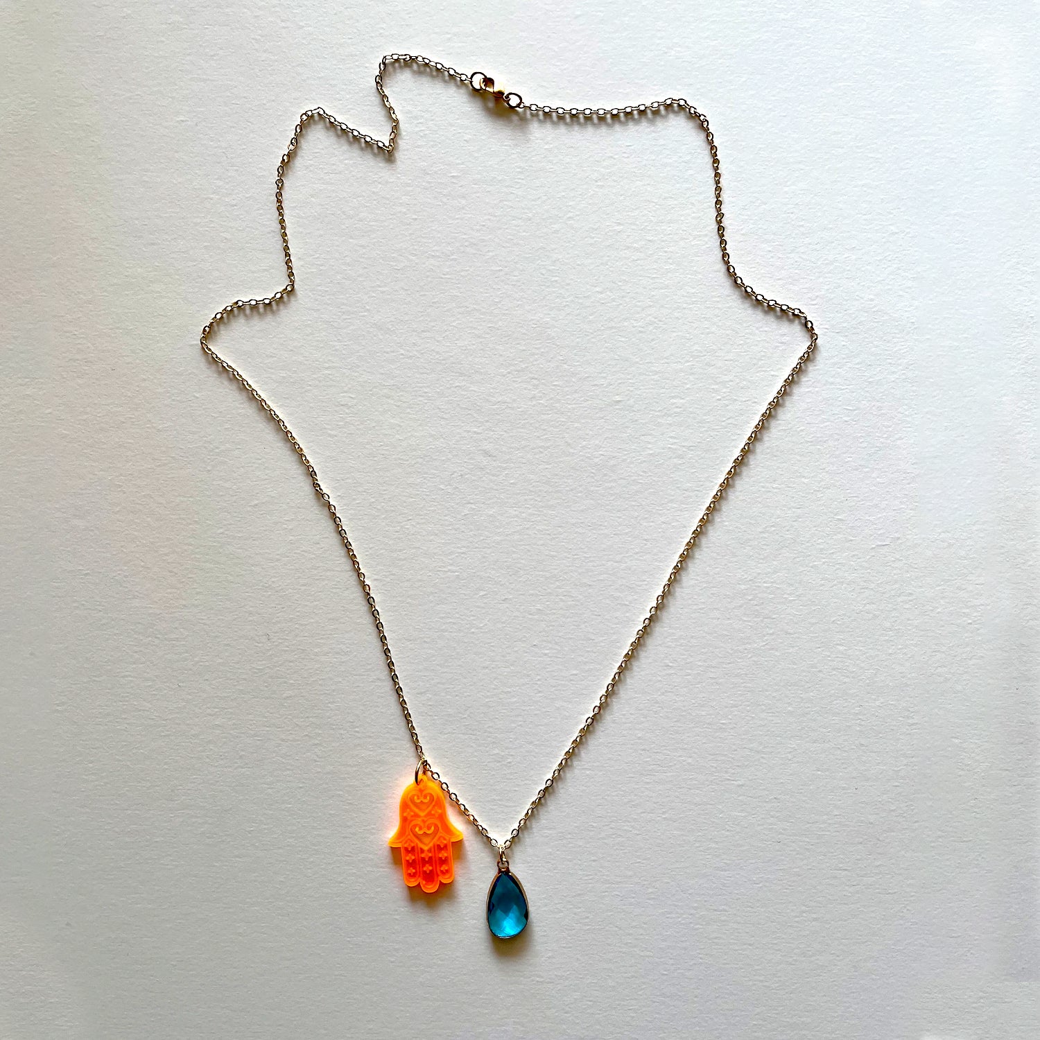 The orange Hamza necklace