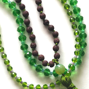 Brown japamala and green crystal necklaces