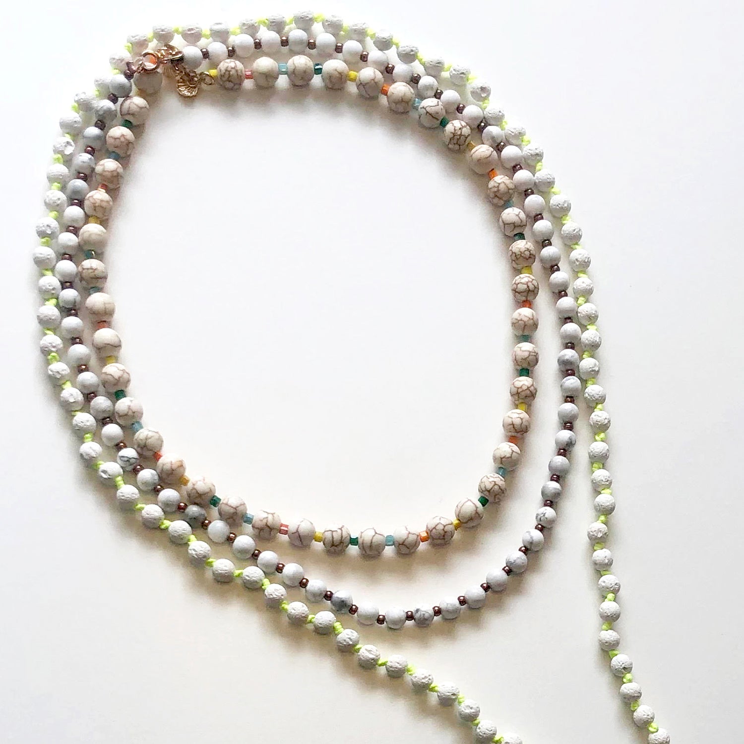 White japamala and crystal necklaces