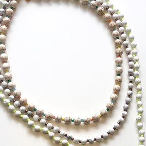 White japamala and crystal necklaces