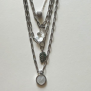 Saint Benedict and silver necklace