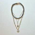 Load image into Gallery viewer, The Saint Benito and blue necklace
