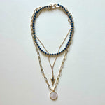 Load image into Gallery viewer, The Saint Benito and blue necklace
