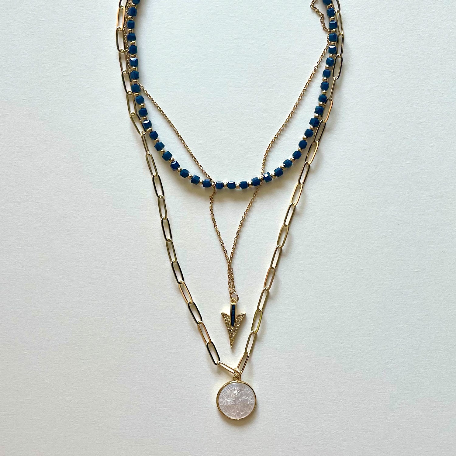 The Saint Benito and blue necklace