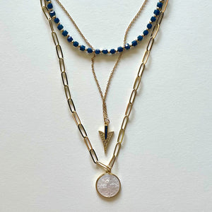 The Saint Benito and blue necklace