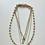Load image into Gallery viewer, The white Saint Benedict and hearts necklaces

