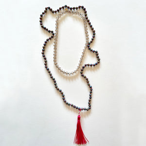 The metallic japamala and the crystal necklace