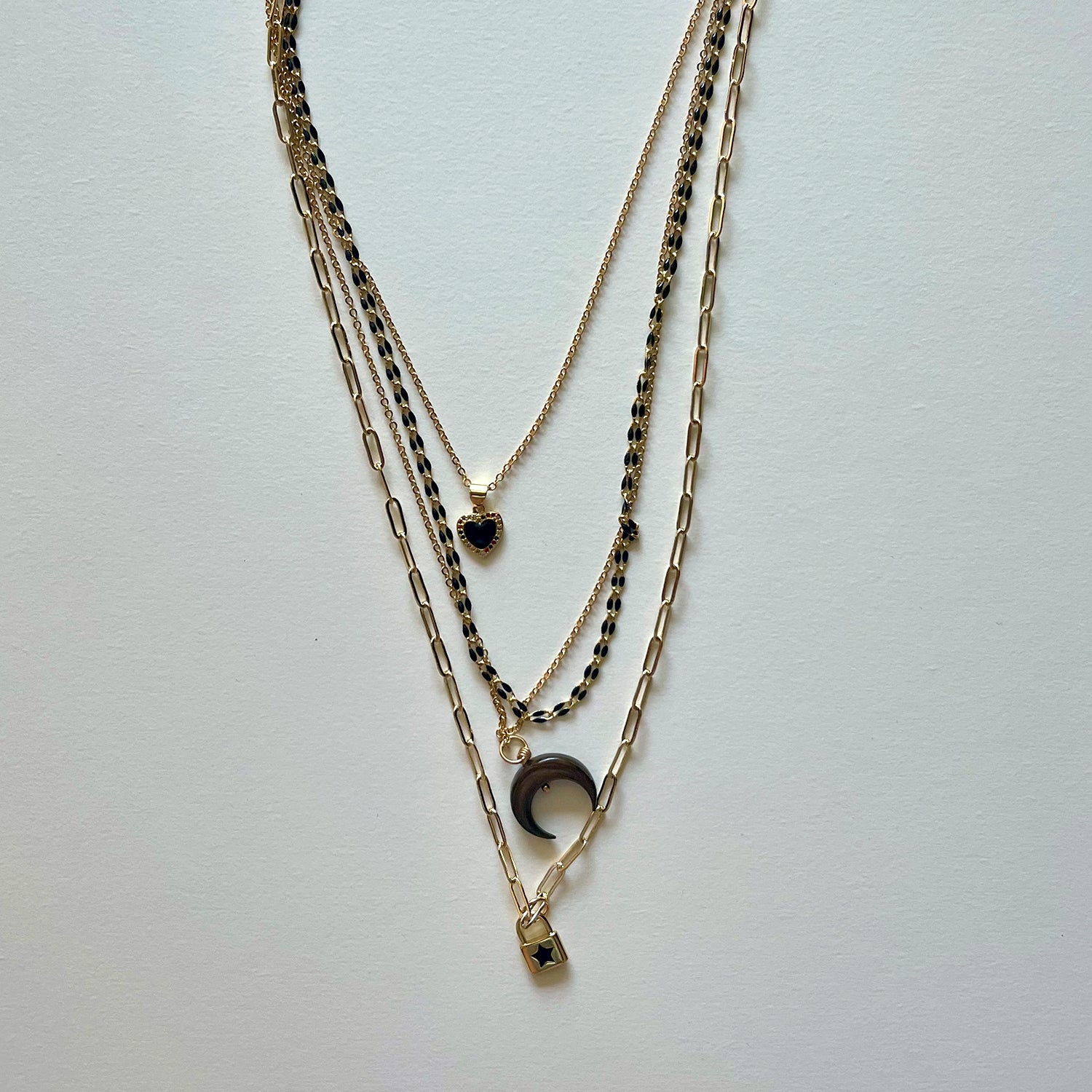 The black moon, heart and lock necklace