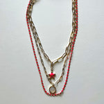 Load image into Gallery viewer, The white Saint Benedict and pink star necklaces
