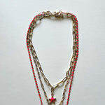 Load image into Gallery viewer, The white Saint Benedict and pink star necklaces
