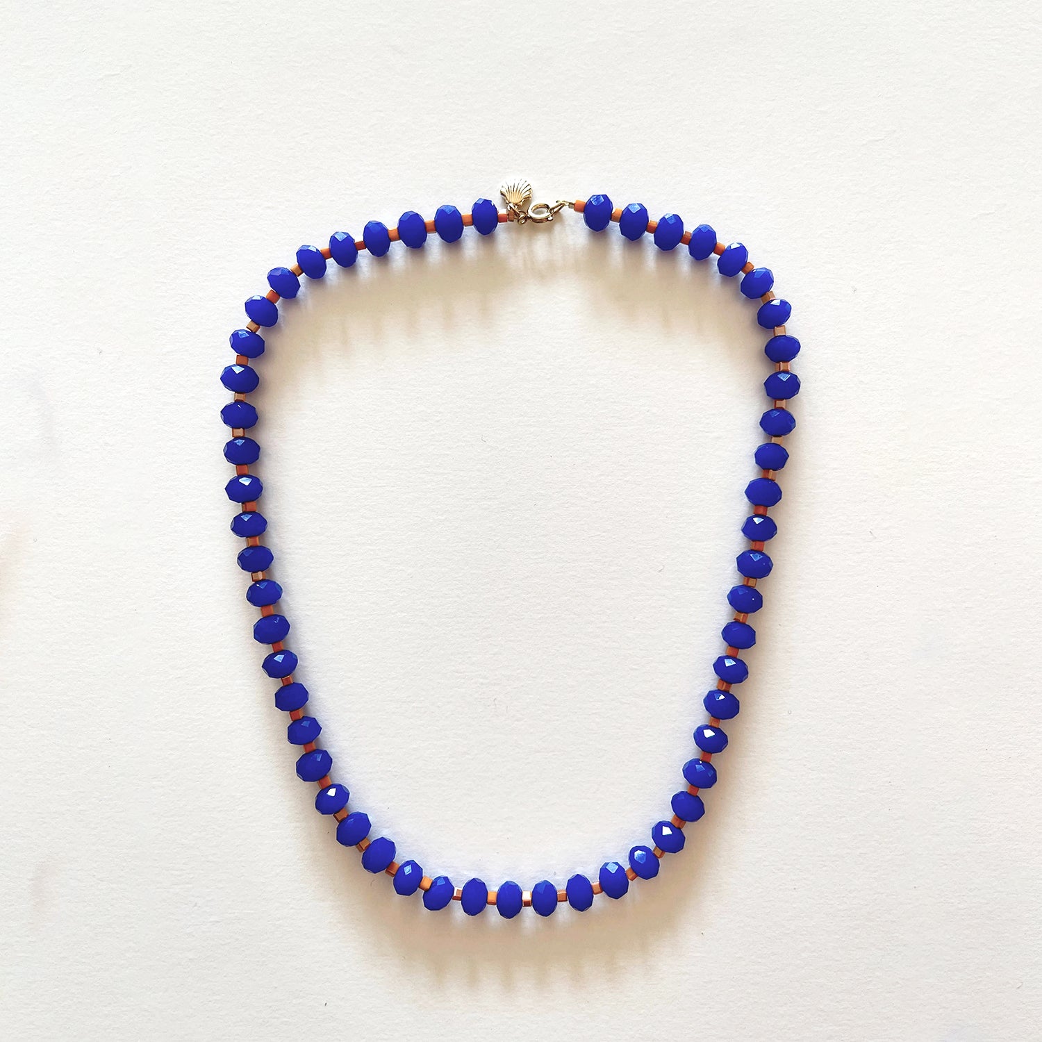 The royal blue and orange necklace