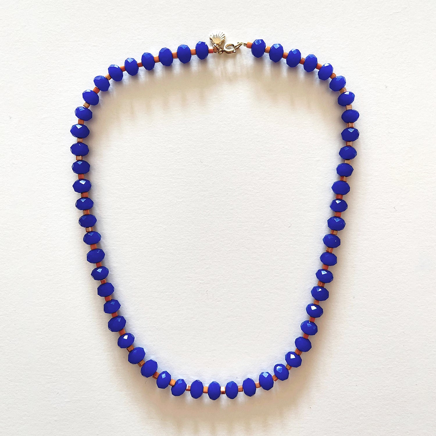 The royal blue and orange necklace