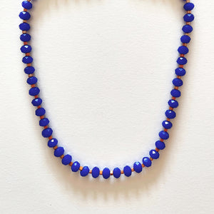 The royal blue and orange necklace