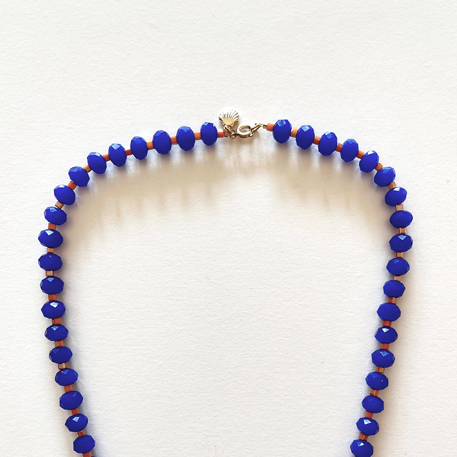 The royal blue and orange necklace