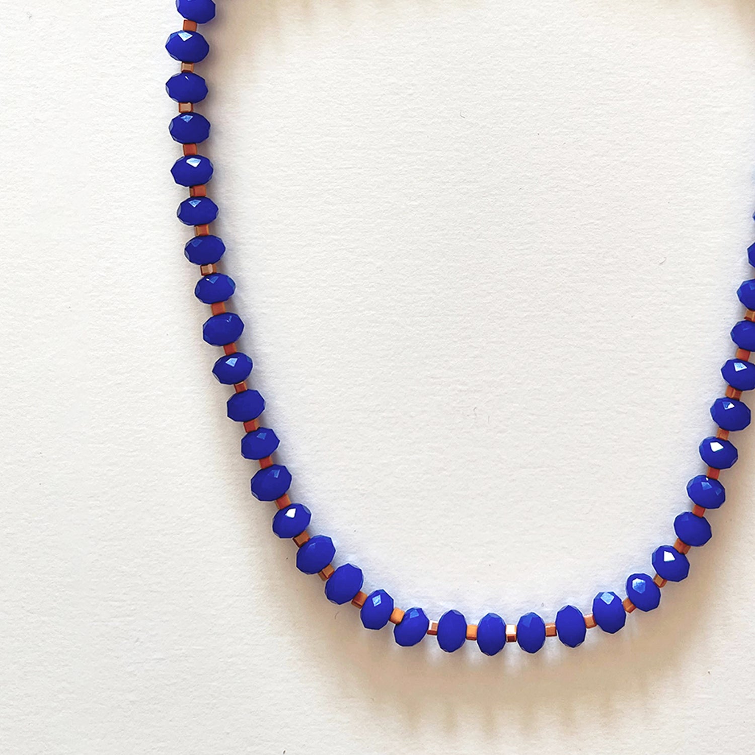 The royal blue and orange necklace