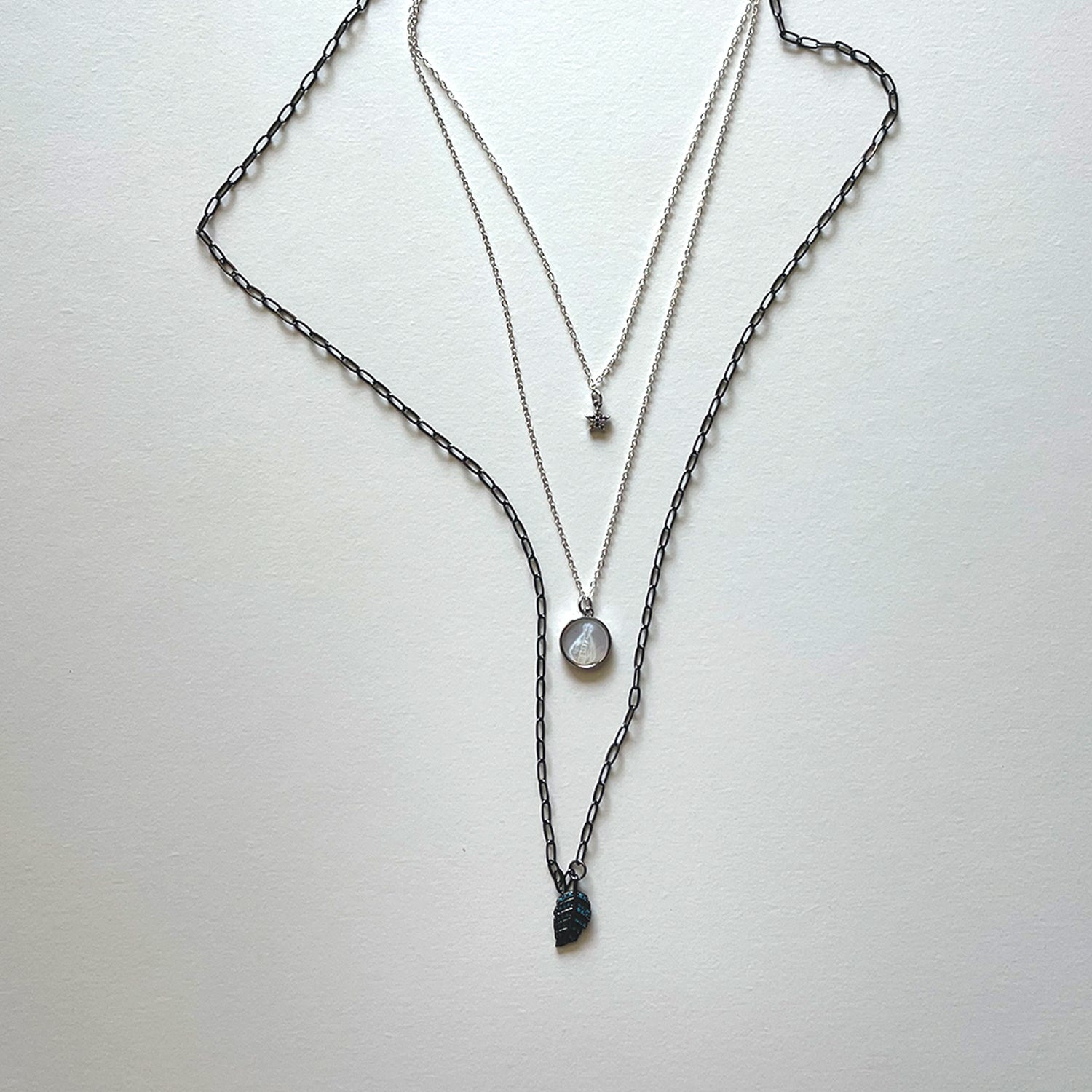 The Virgen del Valle and black necklace