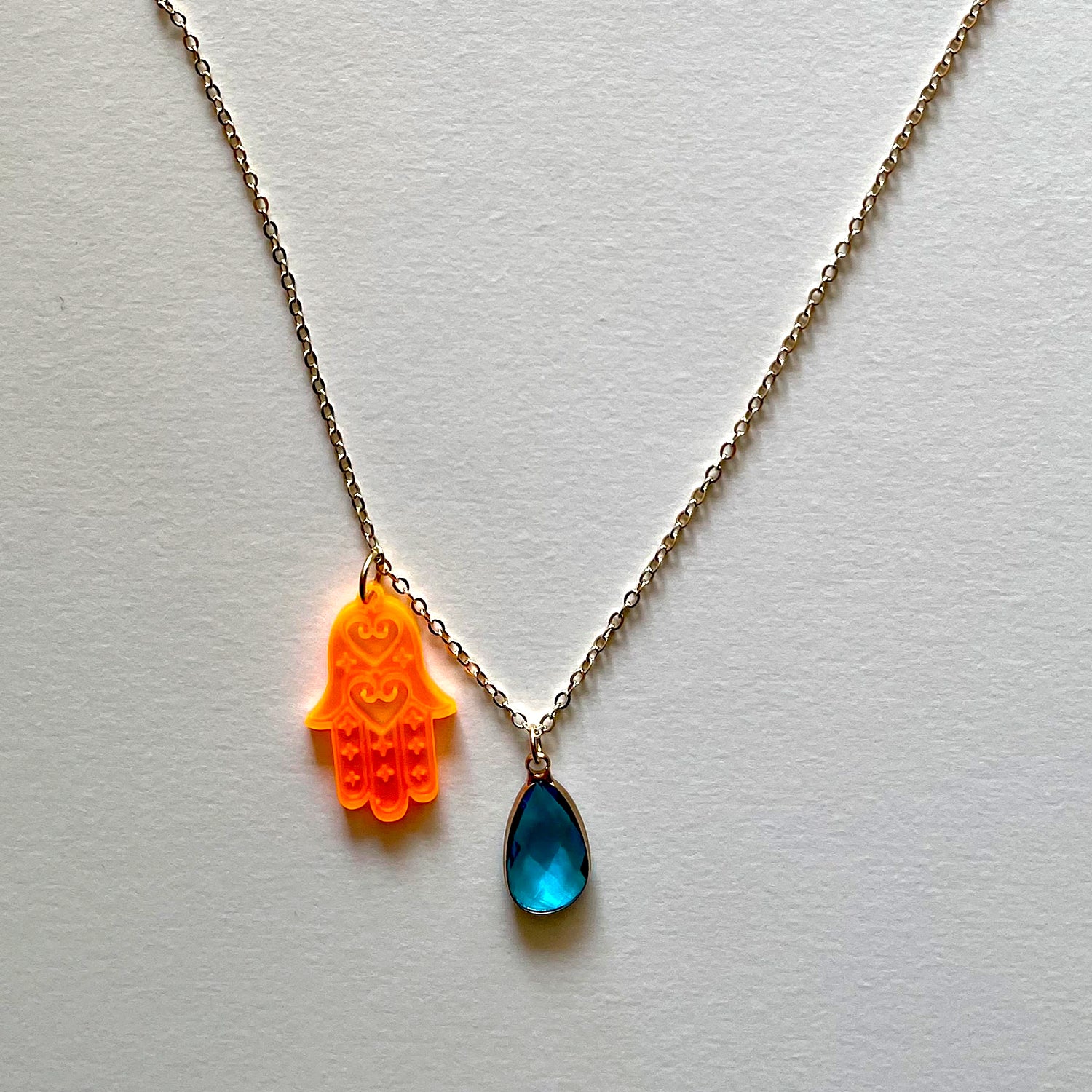 The orange Hamza necklace