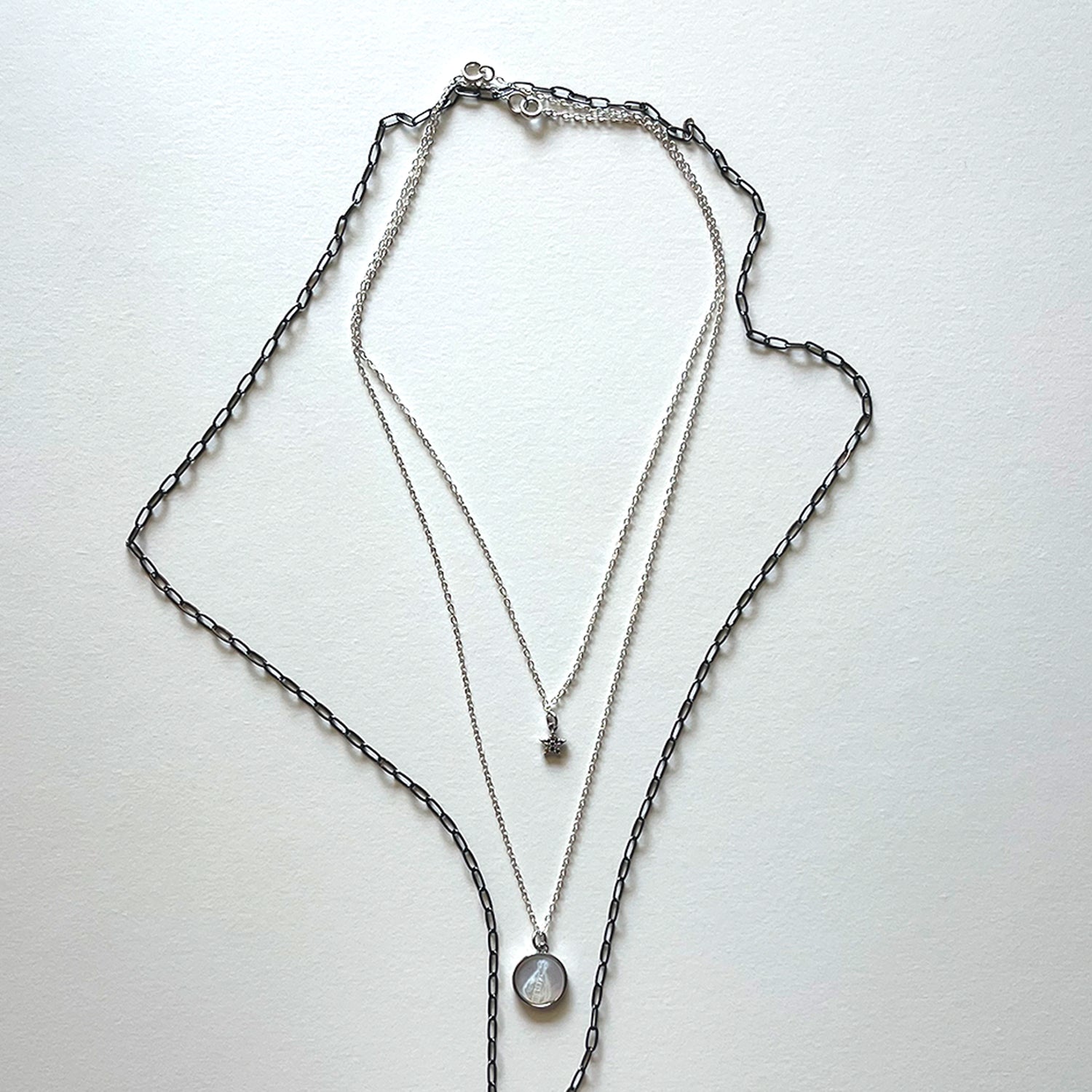The Virgen del Valle and black necklace