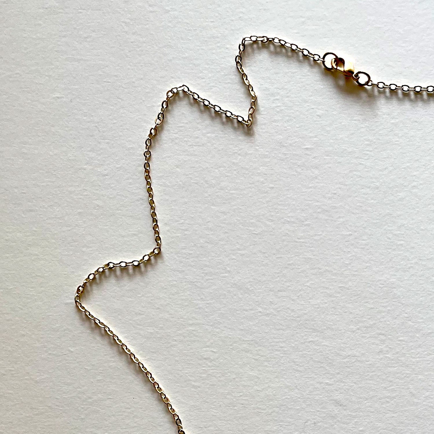 The orange Hamza necklace