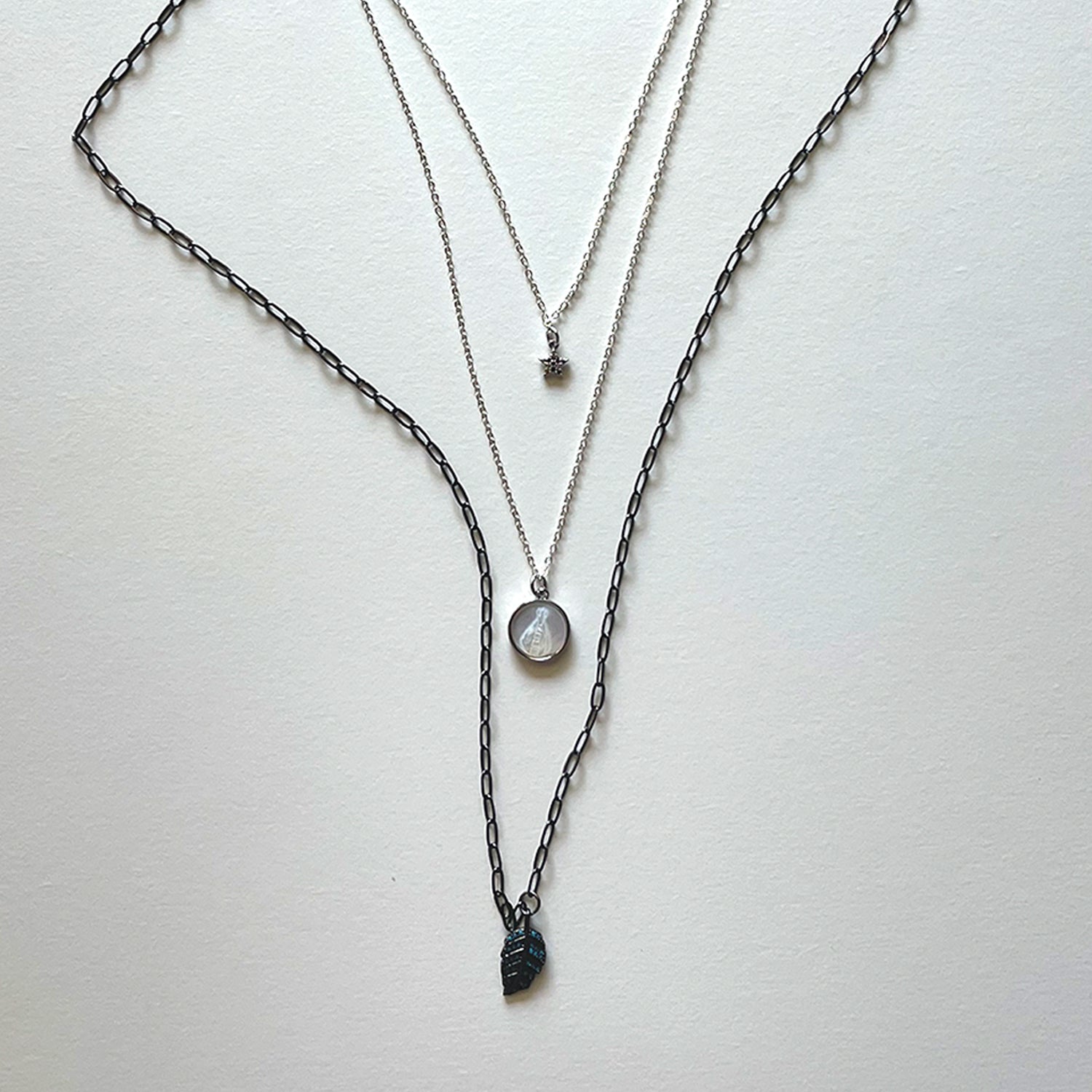 The Virgen del Valle and black necklace