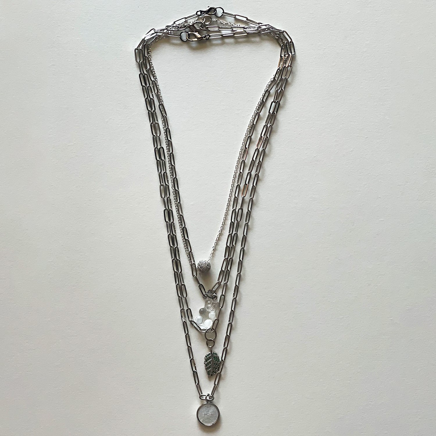 Saint Benedict and silver necklace