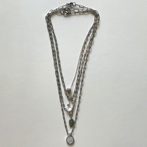 Saint Benedict and silver necklace