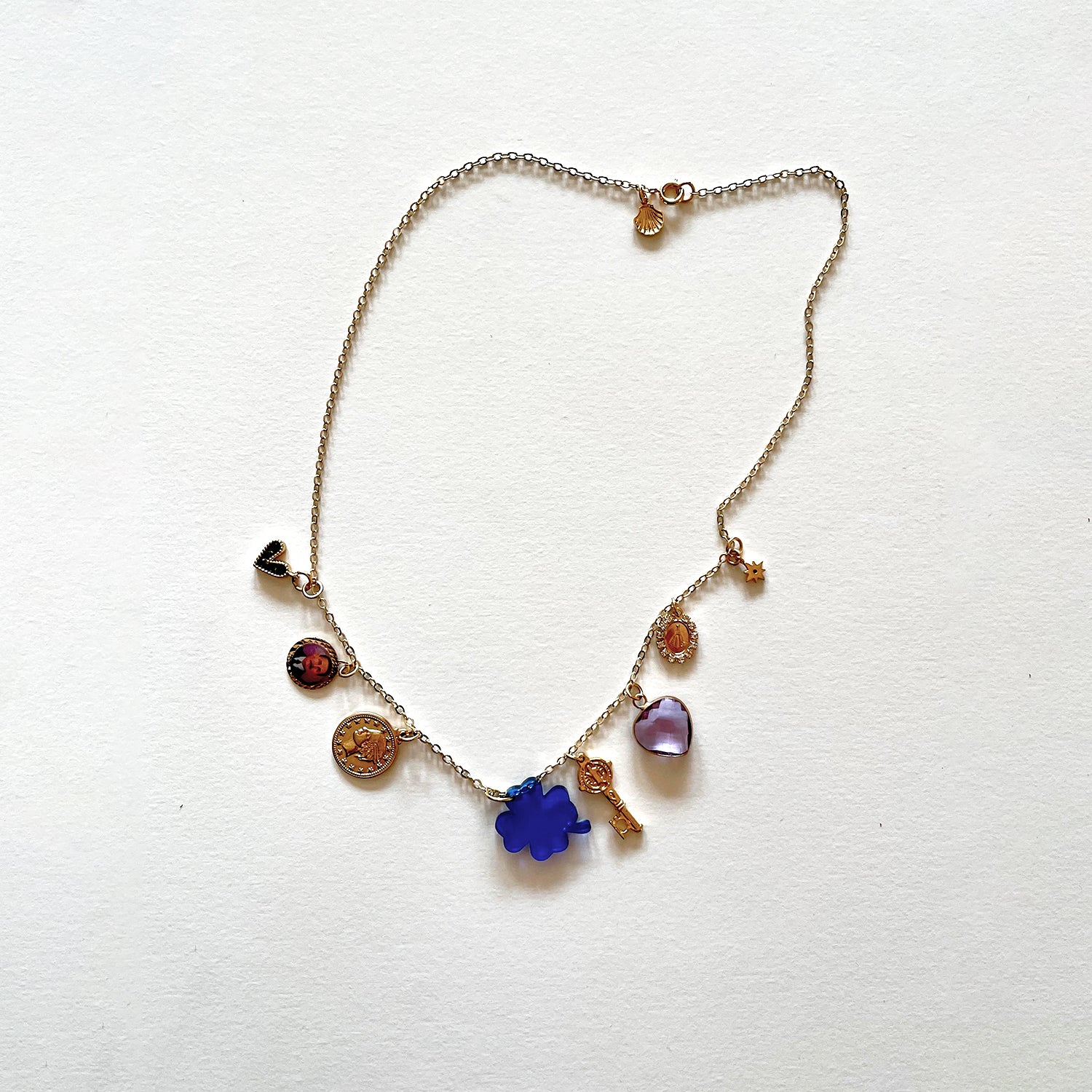 The blue clover and many lucky charms necklace