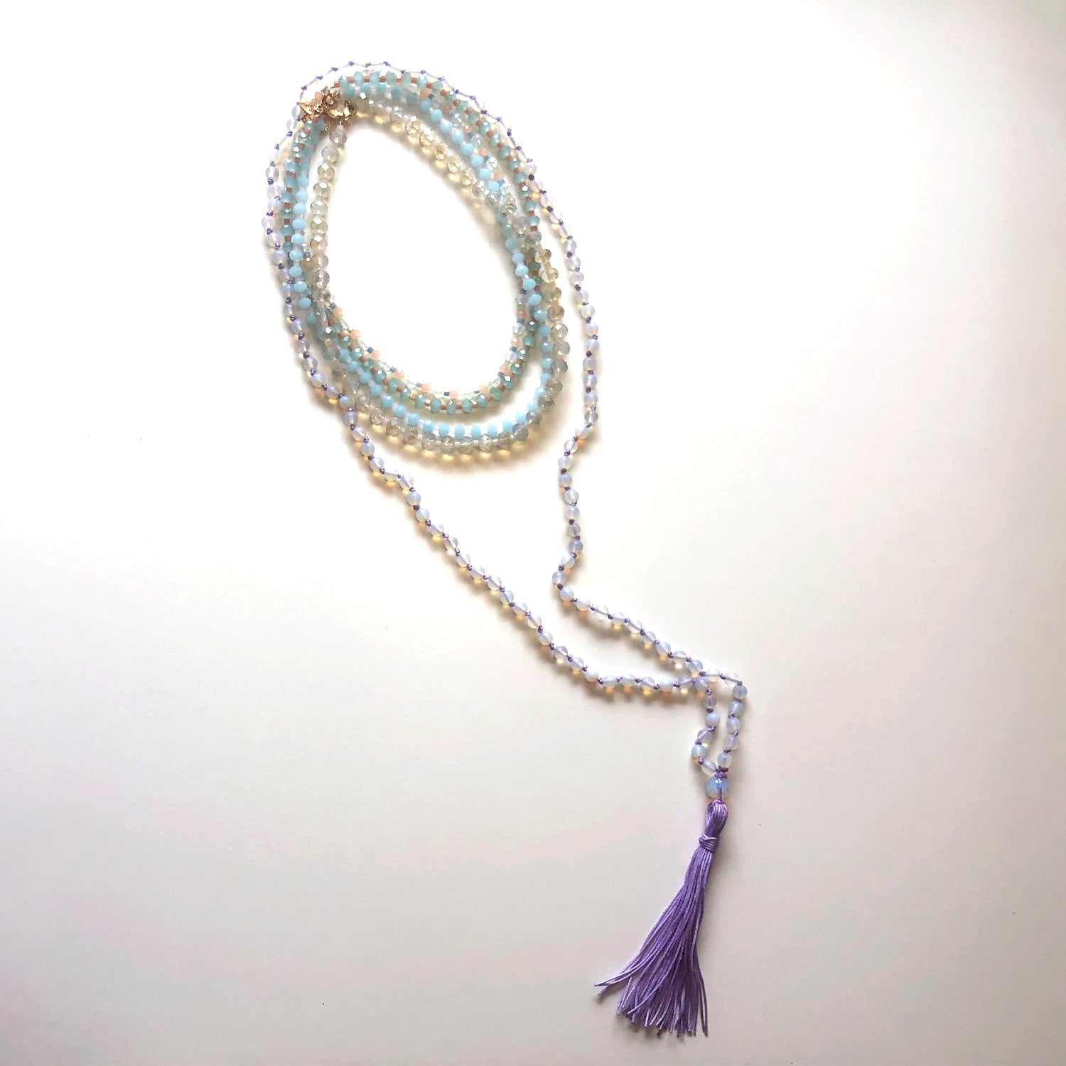 Violet Japamala and blue and white crystal necklace