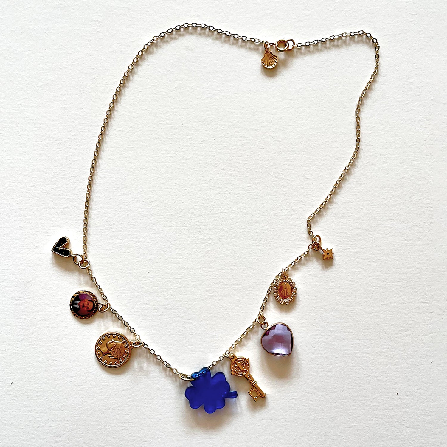 The blue clover and many lucky charms necklace