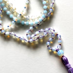 Load image into Gallery viewer, Violet Japamala and blue and white crystal necklace
