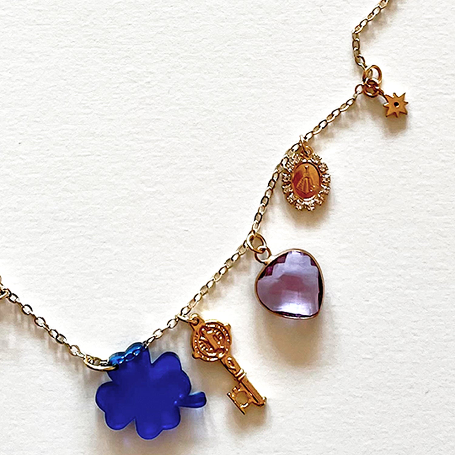 The blue clover and many lucky charms necklace
