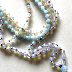 Violet Japamala and blue and white crystal necklace