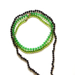 Load image into Gallery viewer, Brown japamala and green crystal necklaces
