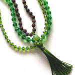 Load image into Gallery viewer, Brown japamala and green crystal necklaces
